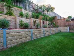 A properly installed retaining wall drainage system managing water flow and preventing erosion in a garden.