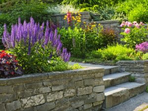 Proper retaining wall drainage system installed to prevent water build-up and ensure structural integrity.