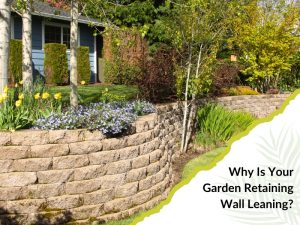 Curved garden retaining wall with flowers and shrubs, exploring causes and solutions for a leaning retaining wall.