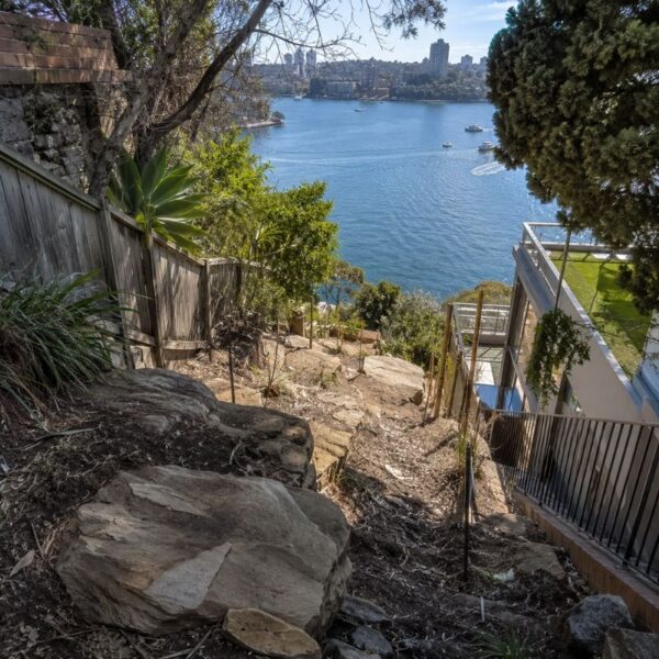 Steep sandstone harbourside block in North Sydney before landscaping