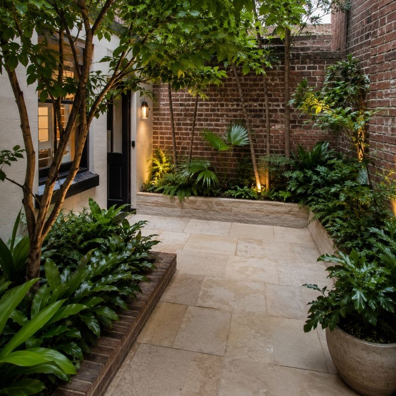 Planted heritage terrace courtyard in the Sydney CBD with shade-tolerant beds